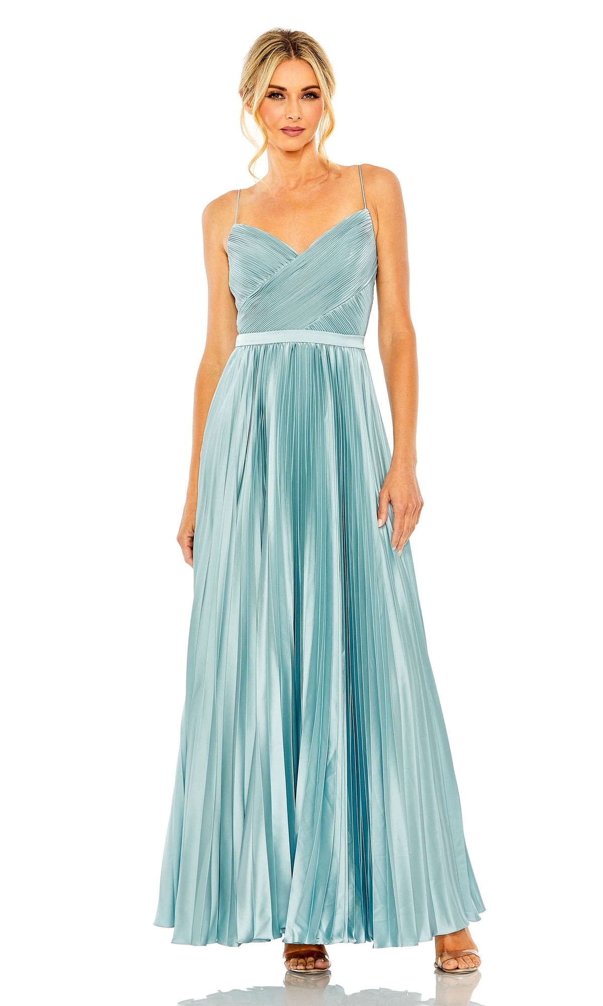 A woman in the Long Formal Dress 49715 by Mac Duggal, a French blue, floor-length pleated gown with spaghetti straps and a v-neckline, standing and facing forward.